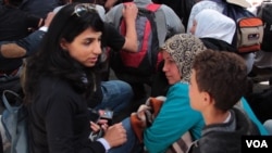 VOA correspondent Ayesha Tanzeem speaks to refugees in Hungary