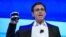 Ford Motor Co. CEO Mark Fields holds up a new Velodyne LiDAR sensor at the Ford news conference at the Consumer Electronics Show in Las Vegas, Jan. 5, 2016. 