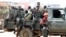 Congolese soldiers are seen on a pick-up truck after dispersing civilians protesting against what they say is the government's failure to stop killings and inter-ethnic tensions in the town of Butembo, North Kivu province, DRC, Aug. 24, 2016.