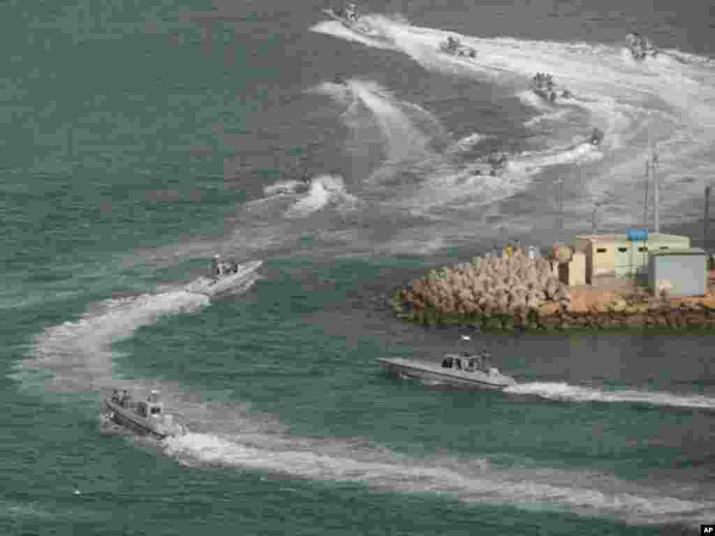 Iranian Navy speed boats attend a drill in the sea of Oman, on December 30, 2011. (AP)