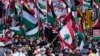 People march on the street as Pro-Palestinian supporters rally in Sydney, Oct. 6, 2024.