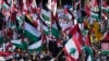 People march on the street as Pro-Palestinian supporters rally in Sydney, Oct. 6, 2024.