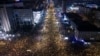 Demonstrators block the Bridge of Freedom during a protest over the collapse of a concrete canopy that killed 15 people more than two months ago in Novi Sad, Serbia, Feb. 1, 2025. 