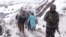 Health Workers Hike Snowy Peaks to Vaccinate Indian Kashmir Villagers