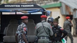 FILE—Counter-terror and regular police provide security at the offices of the Independent National Electoral Commission in Kano, northern Nigeria February 14, 2019. 