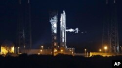 A United Launch Alliance Atlas V rocket stands by on launch complex 41 at the Cape Canaveral Air Force Station in Cape Canaveral, Fla., Dec. 4, 2015.