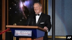 FILE - Sean Spicer speaks at the 69th Primetime Emmy Awards, Sept. 17, 2017, at the Microsoft Theater in Los Angeles. 