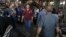 Iranians walk through Tehran's old main bazaar, May 6, 2018. From airplanes to oilfields, billions of dollars are on the line for international corporations as President Donald Trump weighs whether to pull America out of Iran's nuclear deal with world pow
