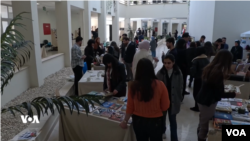 View of an exhibition at Sulaimani University, showcasing the works of young entrepreneurs.