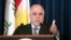 FILE - Iraqi Prime Minister Haider al-Abadi addresses the media during a news conference.