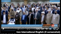 In this screenshot of a Sept. 19, 2024, post on X by Iran International English, Taliban deputy minister Azizurrahman Mansour remains seated during the host country's anthem at the International Islamic Unity Conference in Tehran, Iran.