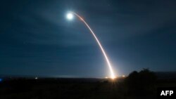 This US Air Force photo shows an unarmed Minuteman III intercontinental ballistic missile as it launches during a developmental test at 12:33 a.m. Pacific Time on February 5, 2020, at Vandenberg Air Force Base, California. - The United States on February…