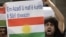 A Kurd opposed to Syrian President Bashar Assad shouts slogans during a sit-in in front of the Syrian embassy, in Beirut, Lebanon, Sunday, Oct. 23, 2011