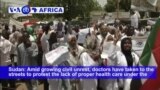 VOA60 Africa - Sudan Protesters Skeptical of Reports Bashir Transferred to Prison