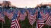 Thousands of U.S. flags are seen at the National Mall, to represent the people who are unable to travel to Washington for the inauguration, Jan. 18, 2021.