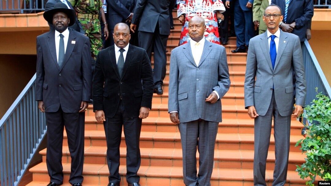 Presidents (from L) Salvar Kiir of South Sudan, Joseph Kabila of DRC, Yoweri Museveni of Uganda and Paul Kagame of Rwanda before the start of the extraordinary summit of the International Conference on the Great Lakes Region (ICGLR) head of states emergen