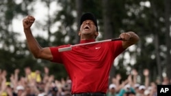 Tiger Woods reacts as he wins the Masters golf tournament Sunday, April 14, 2019, in Augusta, Ga. 