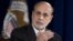 Federal Reserve Chairman Ben Bernanke gestures as he speaks during a news conference at the Federal Reserve Board in Washington, December 12, 2012.