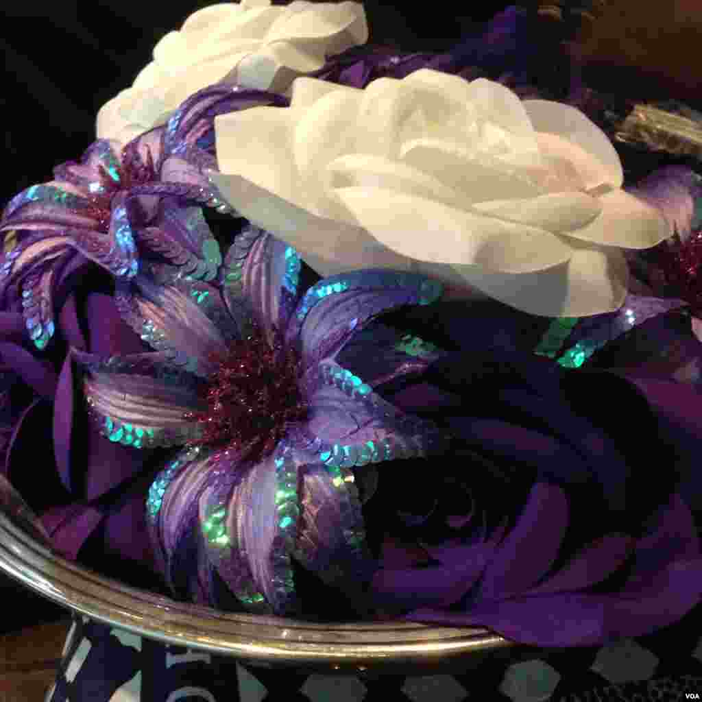 Handmade flowers (purple for women, white for men) are a symbol of beauty and blessing at the Ghana United Methodist Church. (Adam Phillips/VOA)