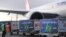 Refrigerated containers with supplies to produce China's Sinovac vaccines against the coronavirus disease arrive at Sao Paulo International Airport in Guarulhos, Brazil, April 19, 2021. The banner reads "Brazil's vaccine."