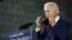 FILE - Democratic presidential candidate former Vice President Joe Biden puts on a face mask after speaking at an event in Lancaster, Pennsylvania, June 25, 2020.