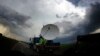 FILE - NOAA mobile doppler radar system tracks tornadic thunderstorm in Clearwater, Kansas, May 19, 2013.