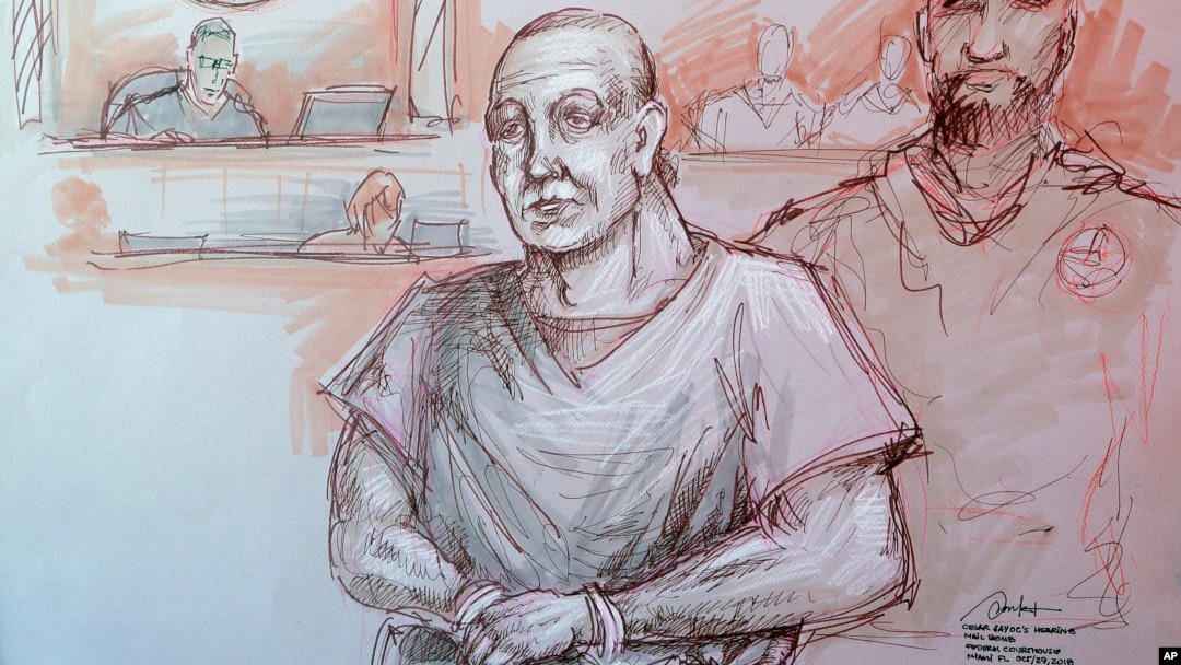 In this courtroom sketch, Cesar Sayoc, left, appears in federal court in Miami, Oct. 29, 2018. 
