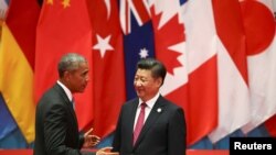 Chinese President Xi Jinping and U.S. President Barack Obama attend the G20 Summit in Hangzhou, Zhejiang province, Sept. 4, 2016.