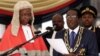 President Robert Mugabe being sworn-in August 22 by Chief Justice Godfrey Chidyausiku