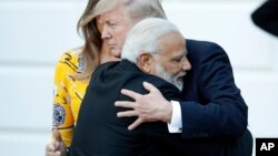 Indian Prime Minister Narendra Modi hugs President Donald Trump as Modi departs the White House, June 26, 2017.