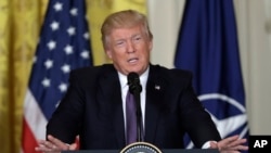 Presiden AS Donald Trump dalam konferensi pers di Gedung Putih, Washington DC, 12 April 2017. (AP Photo/Evan Vucci) 