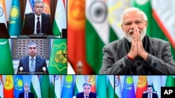 This handout photograph released by India's Press Information Bureau shows Indian Prime Minister Narendra Modi greeting leaders of central Asian countries during a virtual meeting, in New Delhi, India, Jan. 27, 2022. 