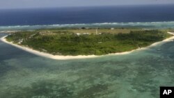 An aerial view of Pag-asa Island, part of the disputed Spratly group of islands, in the South China Sea located off the coast of western Philippines, July 20, 2011