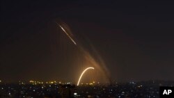 Rockets are launched from the Gaza Strip toward Israel, Nov. 13, 2019. Israeli aircraft have struck Islamic Jihad targets throughout the Gaza Strip while the militant group rained scores of rockets into Israel for a second straight day.