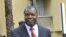 Albert Mabri Toikeusse, nouveau ministre ivoirien de la Planification et du Développement, arrive à une réunion du Cabinet, à Abidjan, le 6 décembre 2010.