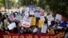 India's Ruling Party Lawmaker Threatens to Shoot Protesters