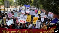 Indian students and activists participate in a protest rally against a new citizenship law, in New Delhi, Jan. 3, 2020.