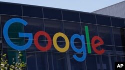 FILE - A Google logo is seen at the company's headquarters in Mountain View, California, July 19, 2016.
