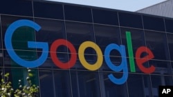 FILE - A Google logo is seen at the company's headquarters in Mountain View, California, July 19, 2016.