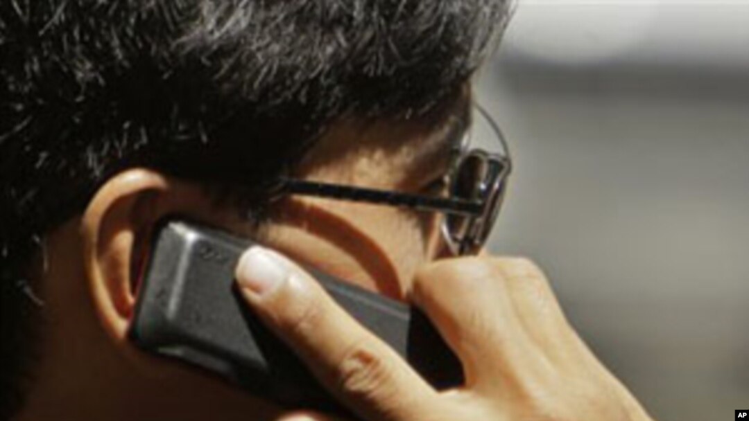 WHO Panel Cites 'Possible' Brain Cancer Risk from Cell Phone Use
