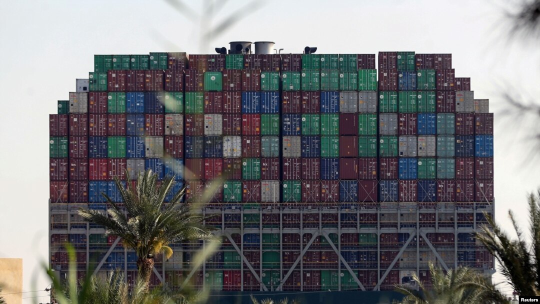 Stranded container ship Ever Given, one of the world's largest container ships, is seen after it ran aground, in the Suez Canal, Egypt, March 26, 2021.
