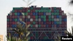 Stranded container ship Ever Given, one of the world's largest container ships, is seen after it ran aground, in the Suez Canal, Egypt, March 26, 2021.