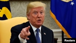 U.S. President Donald Trump speaks in the Oval Office of the White House in Washington, Oct. 10, 2017. 