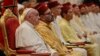 Pope Francis sits next to King Mohammed VI at the diocesan Caritas center in Rabat, Morocco, March 30, 2019.