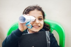 A Syrian girl plays in Himaya Center, a Lebanon-based NGO working to educate children, mainly girls, and their families of the risks of child marriage. (Nisan Ahmado/VOA)