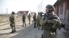 Fighting Rages Outside Mariupol Despite Cease-Fire