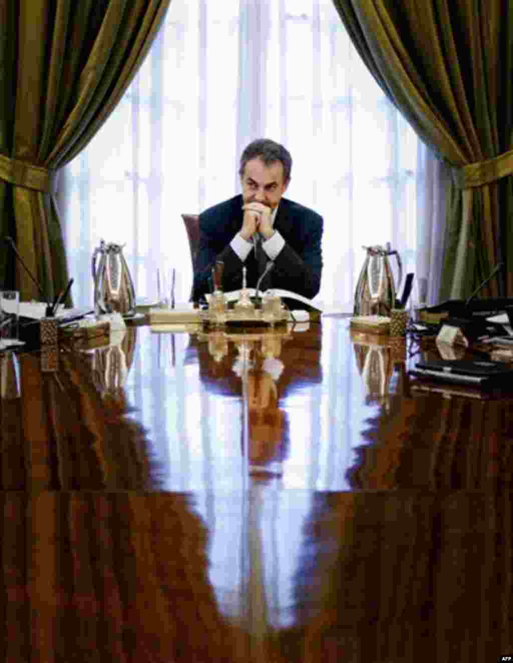 Spain's Prime Minister Jose Luis Rodriguez Zapatero is seen before a cabinet meeting at Moncloa Palace, in Madrid, Friday, July 22, 2011. Investors are easing pressure on Spanish markets in reaction to the European Union's new deal to help Greece with ano