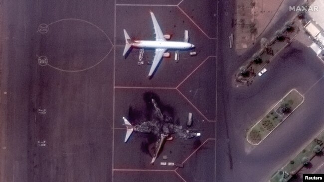Satellite image shows a destroyed Ukrainian airplane at Khartoum International Airport in Khartoum, Sudan April 17, 2023, in this handout image. Courtesy of Maxar Technologies/Handout via REUTERS