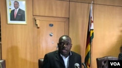 Minister Sibusiso Moyo Zimbabwe's Foreign Affairs – speaking to reporters Harare (08/12/2018) - laments the move by President Donald Trump to sign the Zimbabwe Democracy and Economic Recovery Amendment Act of 2018, last week. (C. Mavhunga/VOA)