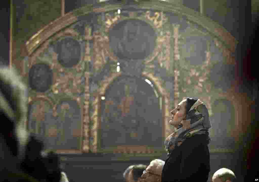 Russian Orthodox Church Patriarch Krill, on podium, conducts a religious service for killed Russian ambassador to Turkey, Andrei Karlov inside the Christ the Saviour Cathedral in Moscow. Karlov was fatally shot by a Turkish policeman in a gathering in Ankara.